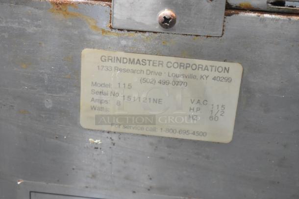 Grindmaster 115 stainless steel coffee grinder, 115V, 1 phase, model 115, serial 151121NE, used, manufacturer's label visible.