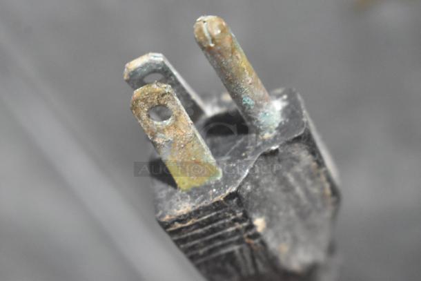 Close-up of a corroded power plug from a Connolly G-270 hot dog roller. 120 volts, 1 phase. Needs repair.