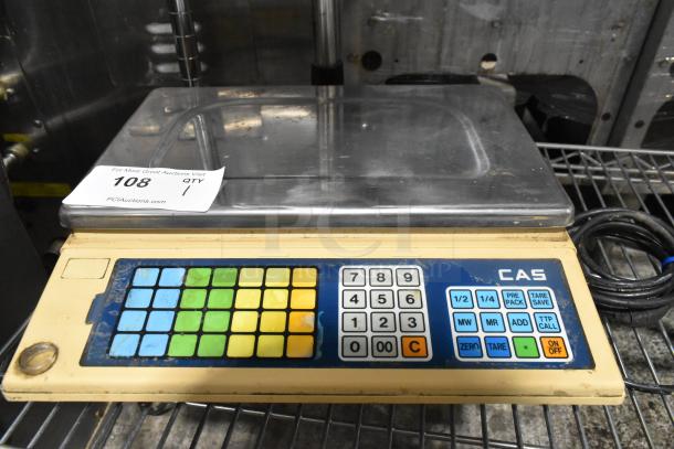 CAS AP-1 metal countertop food portioning scale, 120 volts, features numeric keypad and function buttons, used condition.