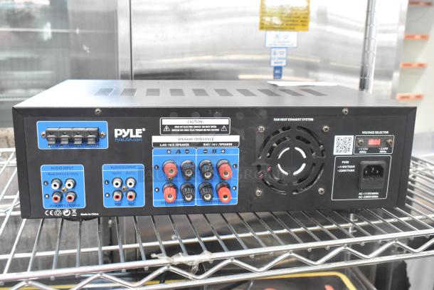 Pyle PT390BTU Digital Home Theater Bluetooth Stereo Receiver, featuring audio inputs and outputs, fan heat exhaust, voltage selector.