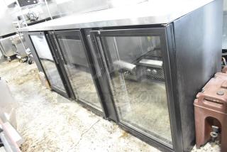 2017 True TBB-4G-LD commercial back bar cooler with three glass doors. 115 volts, 1 phase. Good condition.