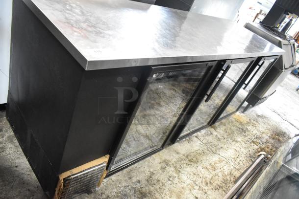 2017 True TBB-4G-LD commercial back bar cooler, 3 glass doors, metal top, good condition, 115 volts, 1 phase.