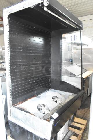 Master-Bilt metal commercial open grab n go merchandiser, missing one side panel, showcasing interior fans and shelving design.