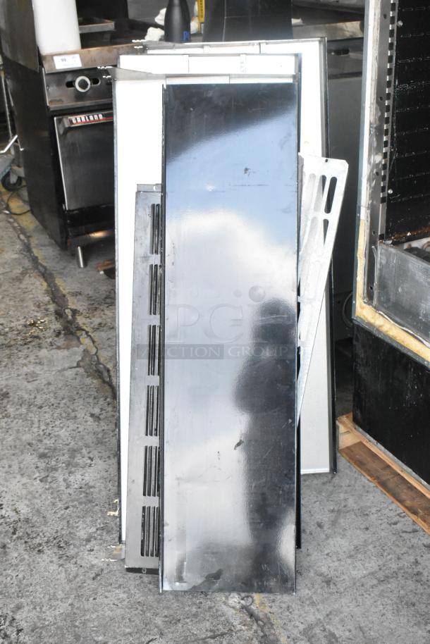 Master-Bilt Metal Commercial Open Merchandiser, missing one side panel, visible metal components, used condition.