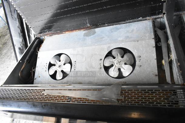 Master-Bilt metal commercial open grab 'n go merchandiser, missing one side panel, featuring two visible ventilation fans.
