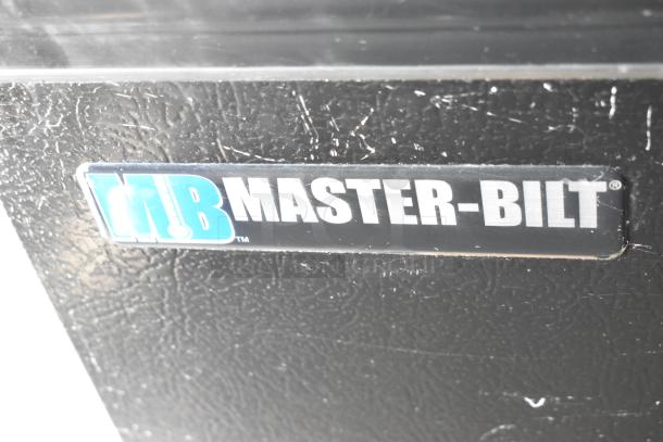 Master-Bilt metal commercial open grab 'n go merchandiser, model with missing side panel, branded logo visible.