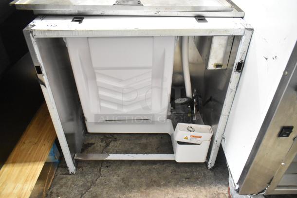 Osion OCM-350 stainless steel commercial undercounter cooler. Single door, 115 volts, used condition, visible wear.