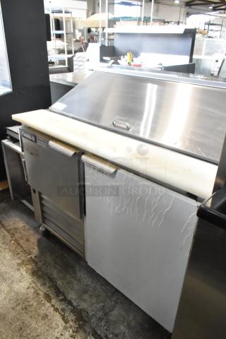 2018 Leader LM48 S/C stainless steel sandwich salad prep table, commercial casters, 115V, 1 phase, visible signs of wear.