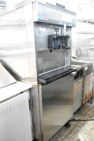 Electro Freeze 88T-CMT-113 Stainless Steel Commercial Floor Style Water Cooled 2 Flavor w/ Twist Soft Serve Ice Cream Machine on Commercial Casters. 230 Volts, 1 Phase. - Item #1197836