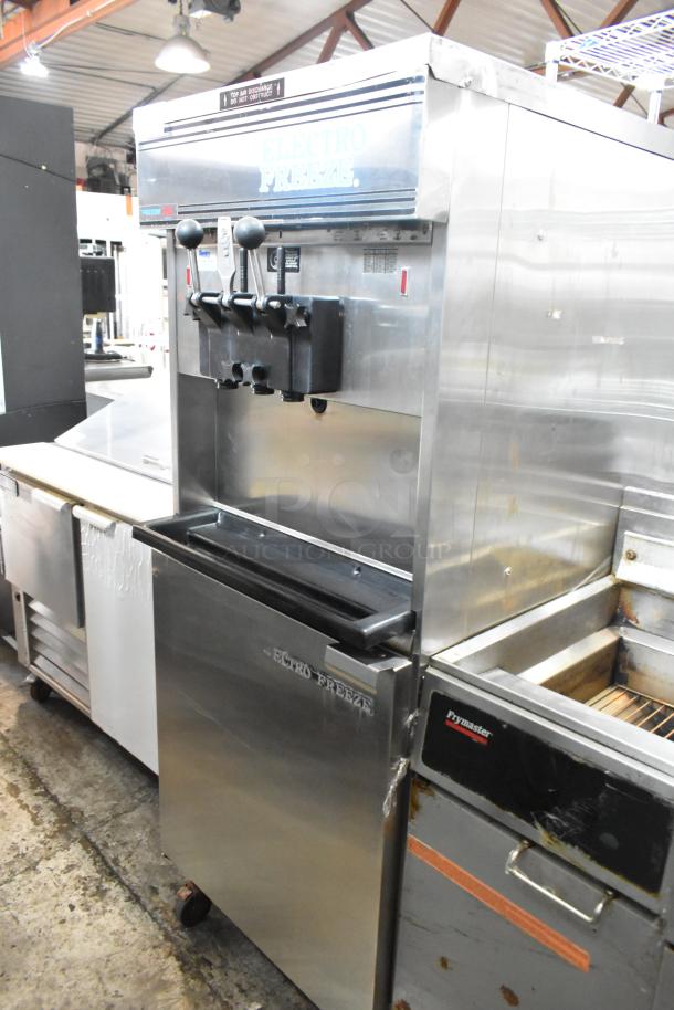 Electro Freeze 88T-CMT-113 stainless steel soft serve machine, water-cooled, 2 flavors plus twist, on casters, 230V, 1 phase.