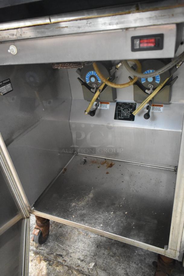Electro Freeze 88T-CMT-113 stainless steel commercial soft serve ice cream machine, water-cooled, on casters, 230V, 1 phase.