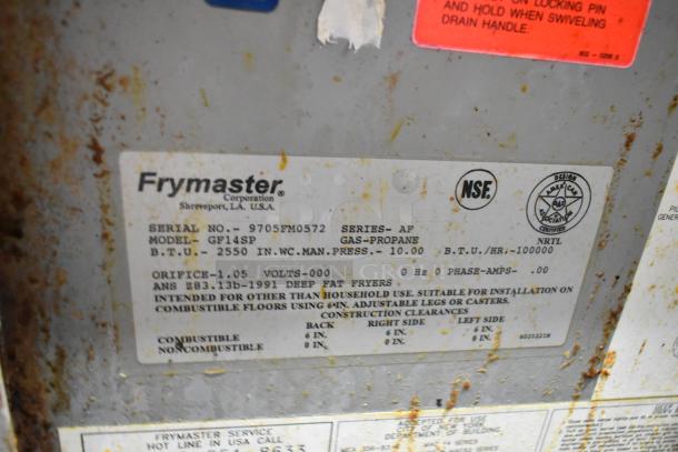 Rusted Frymaster GF14SP propane fryer label detailing model, 100,000 BTU, ANSI certification, and installation instructions.