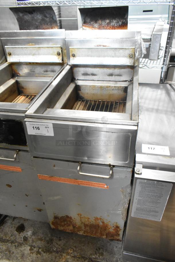 Frymaster GF14SP propane deep fryer, commercial floor style, 100,000 BTU, metal, visible wear and rust. Auction tag 116.