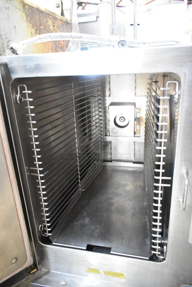 Cleveland 22CGT6.1 stainless steel single deck steam cabinet, natural gas powered, commercial use, interior view.