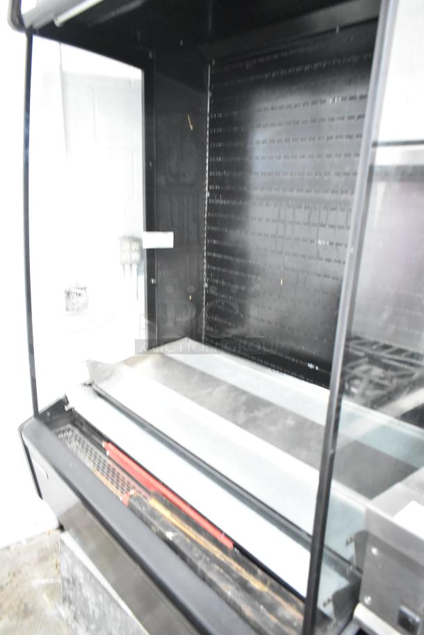 Master-Bilt metal commercial reach-in Grab N Go merchandiser. Black finish, spacious interior, good condition.