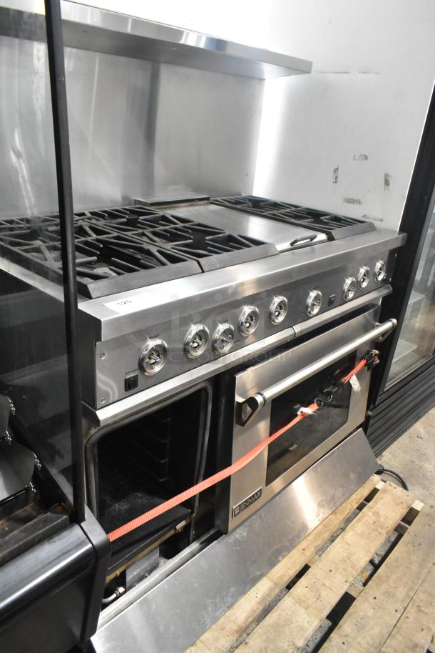 Jenn-Air stainless steel commercial 6 burner range with oven, over shelf, and backsplash in good condition, model visible.