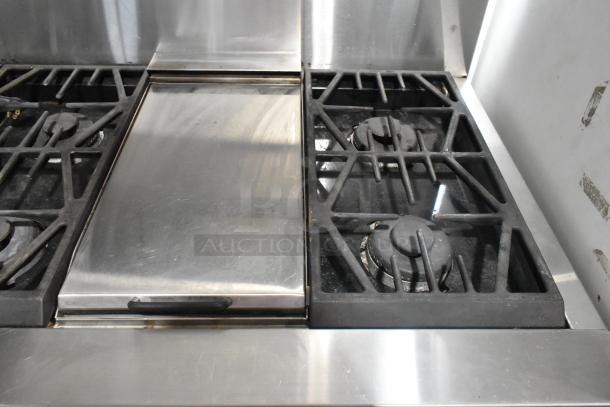 Jenn-Air stainless steel commercial 6 burner range with oven, over shelf, and backsplash. Used condition.