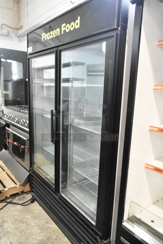 True GDM-49F commercial 2-door reach-in freezer, metal finish, poly-coated racks, 115/208-230V, labeled "Frozen Food".