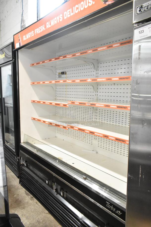 Turbo Air TOM-72E commercial open merchandiser with metal shelves, 220 volts, 1 phase, branded "Always Fresh. Always Delicious."