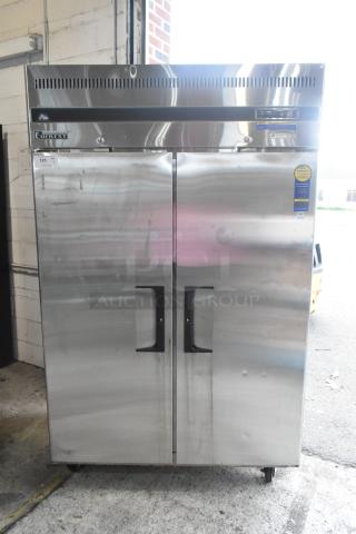 Everest ESR2 stainless steel 2-door commercial cooler with poly coated rack, on commercial casters, 115 volts, 1 phase.