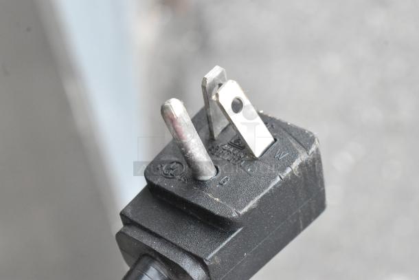 Plug close-up of Everest ESR2 Stainless Steel Commercial 2 Door Reach In Cooler, highlighting the 115-volt power connection.