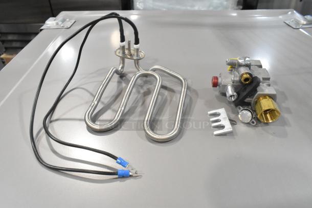 Brand new Blodgett 55127 safety valve and burner. Includes safety valve with 1/4 inch fitting and burner components.
