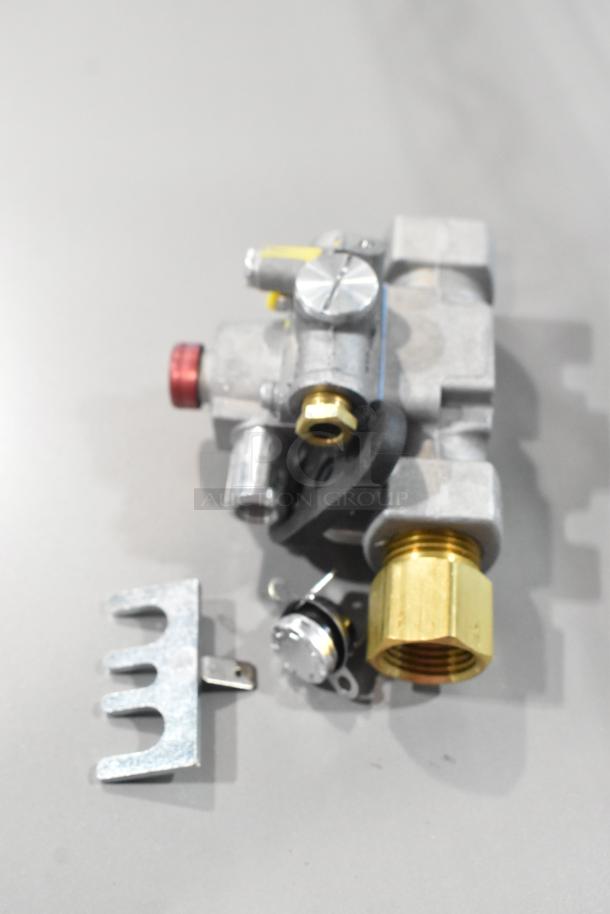 Brand new Blodgett 55127 safety valve with 1/4-inch fitting and burner. Scratch and dent, high-quality components.