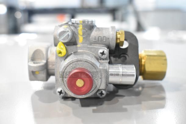 Brand new Blodgett 55127 safety valve, scratch and dent, 1/4 inch size, with visible yellow markings and brass connectors.