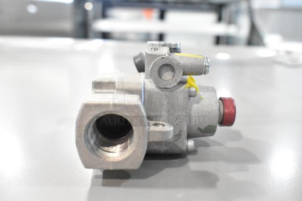 Blodgett 55127 safety valve and burner, brand new, minor scratches and dents visible, auction item, 1/4-inch size.