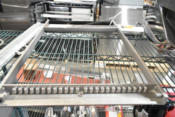 Brand new cutter, scratch and dent, metal frame, tensioned wires, sturdy build, slight imperfections visible.