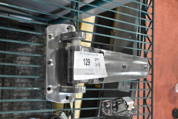 Brand new hinge with visible scratch and dent condition, includes label stating "129 QTY x 4" for auction.