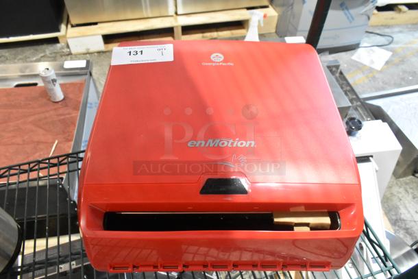 BRAND NEW Georgia Pacific enMotion Red Poly Wall Mount Paper Towel Dispenser, with minor scratches, label shows "131 QTY 1".