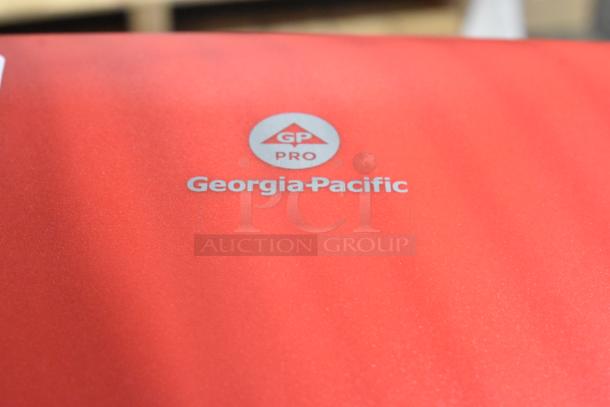 Red Georgia Pacific enMotion poly paper towel dispenser, wall mount, new with minor imperfections, branded GP PRO logo visible.