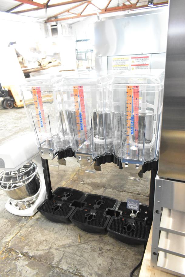Brand new Carnival King 382RBD5G3 15-gallon triple bowl beverage dispenser, scratch and dent condition, clear bowls.