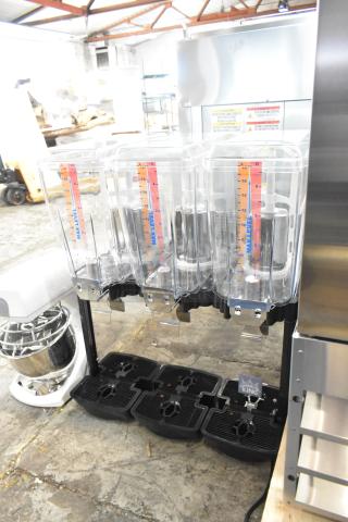 Brand new Carnival King 382RBD5G3 15-gallon triple bowl beverage dispenser, scratch and dent condition, clear bowls.