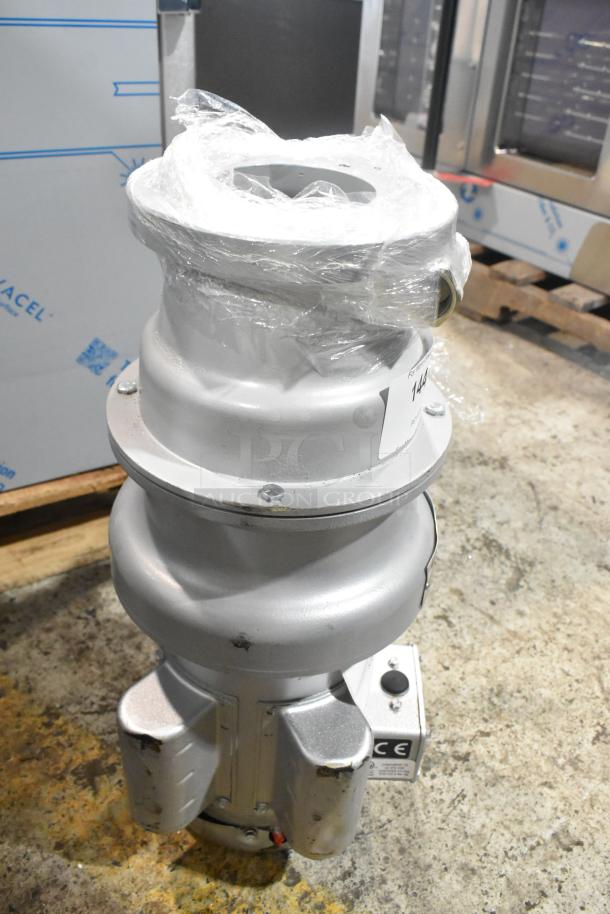 BRAND NEW Hobart FD4/125-3 commercial garbage disposer, 1 1/4 hp, 120/208-240V, short upper housing, minor dents.