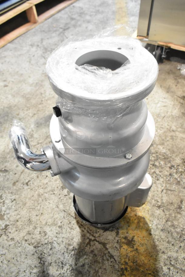 Brand new Hobart FD4/125-3 commercial garbage disposer with short upper housing, 1 1/4 hp, 120/208-240 volts.
