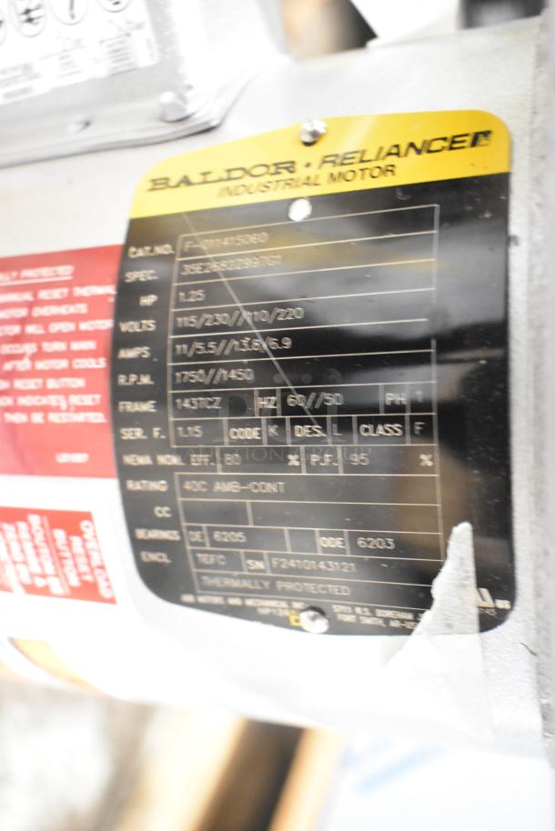 Hobart FD4/125-3 commercial disposer, 1.25 hp motor label, showing specs and thermal protection. Brand new with minor dents.