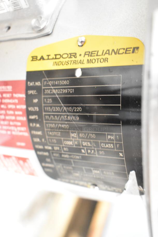 BRAND NEW Hobart FD4/125-3 commercial garbage disposer, 1.25 hp, with short upper housing. Label shows Baldor-Reliance motor specs.