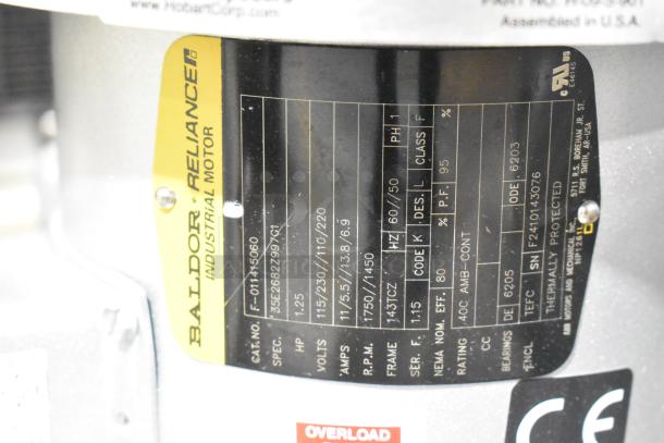 Brand new Hobart FD4/125-4 commercial garbage disposer, 1 1/4 hp, 120/208-240 volts, visible motor specs plate.