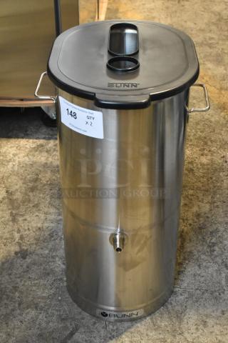 Bunn TDO-5 5 Gallon Iced Tea Dispenser with brew-through lid, new condition, stainless steel, auction lot tag visible.