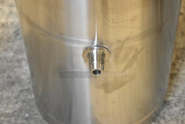 Bunn TDO-5 Iced Tea Dispenser, 5-gallon, stainless steel, brew-through lid, near new with minor scratches, side view with spout.