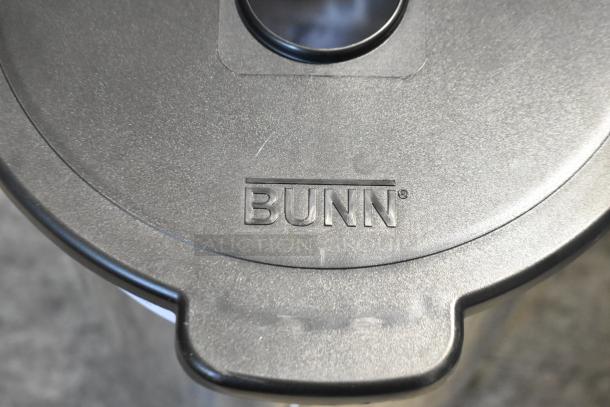 Bunn TDO-5 5-gallon iced tea dispenser lid, embossed with "BUNN," brand new with minor scratches.