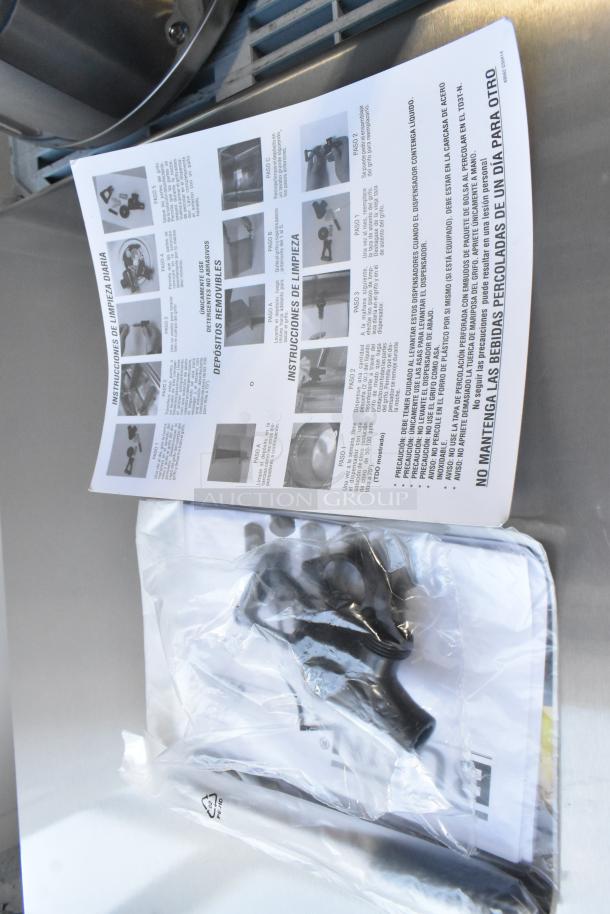 Bunn TDO-5 iced tea dispenser parts in plastic bag with instruction manual, item is brand new but scratch and dent.