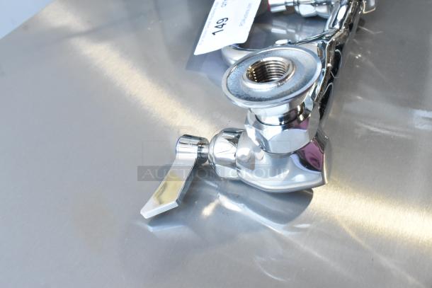 Chrome faucet with handles, brand new, minor scratches and dents. Auction tag reads "149". Ideal for replacement or upgrade.