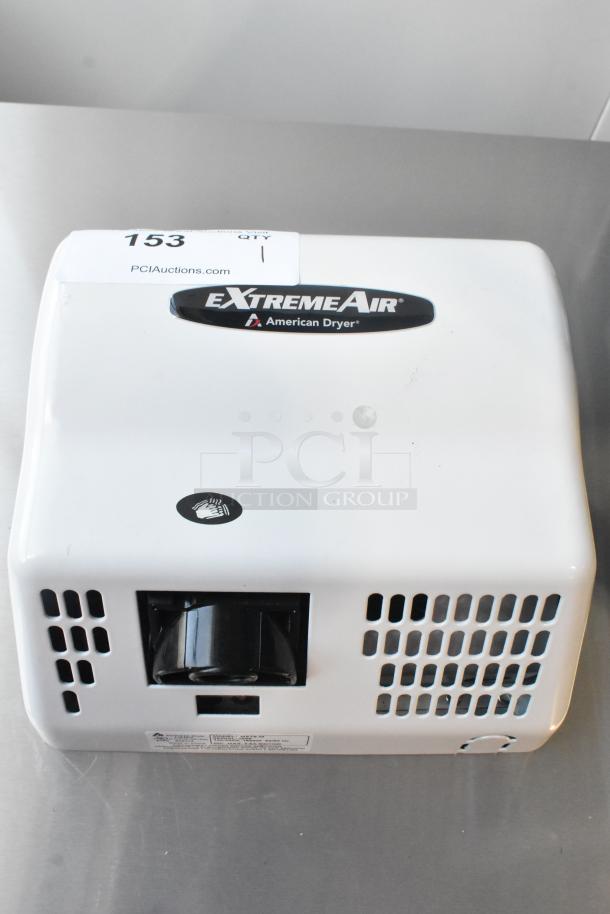 Brand new American Dryer GXT9-M ExtremeAir hand dryer, steel white cover, 100/240V, 1 phase. "eXtremeAir" logo visible.