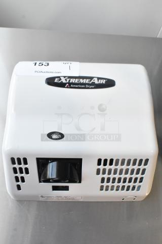 Brand new American Dryer GXT9-M ExtremeAir hand dryer, steel white cover, 100/240V, 1 phase. "eXtremeAir" logo visible.