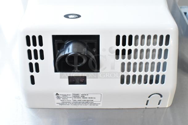 Brand new American Dryer GXT9-M ExtremeAir automatic hand dryer, white steel cover, 100/240V, scratch and dent condition.
