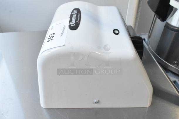 BRAND NEW American Dryer GXT9-M ExtremeAir Automatic Hand Dryer with white steel cover, showing minor scratches. Model shown.