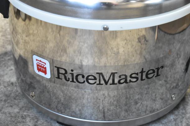 Brand new Town 56916S 72 cup rice warmer, stainless steel, 120V, 1 phase. "RiceMaster" label shown. Scratch and dent condition.
